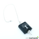 Péndulo shungita simbología árbol vida